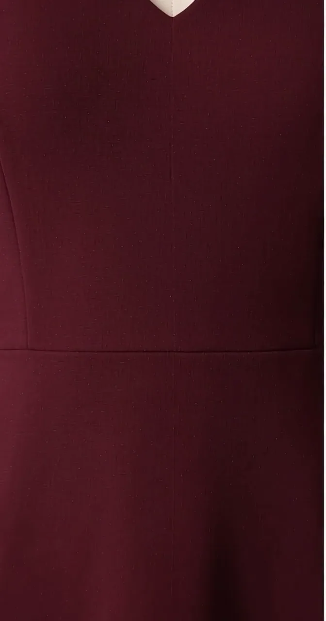 Poster frame from a real 8-second minimal-studio clothing video workflow